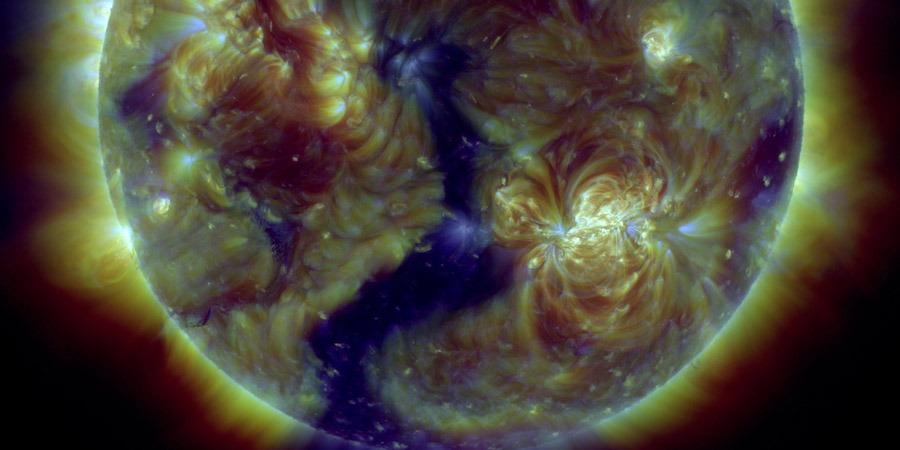 Sunspot region 2403, coronal hole facing Earth